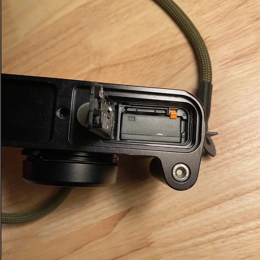 Fujifilm Black Camera with Olive Strap